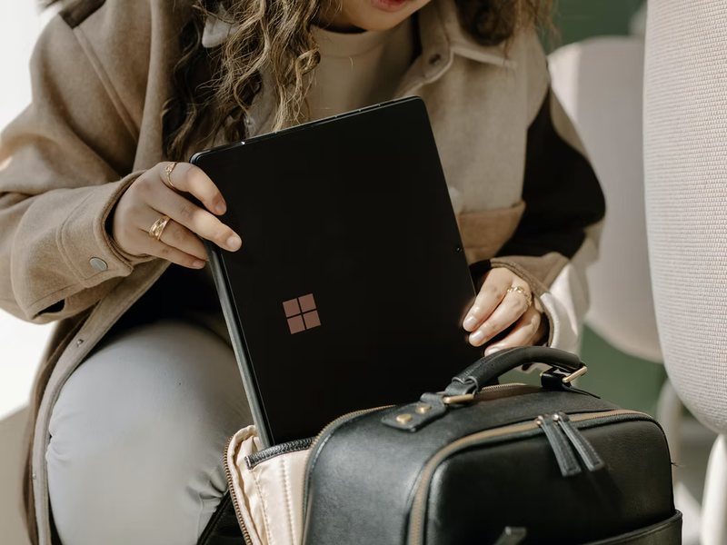 A woman working on a laptop
