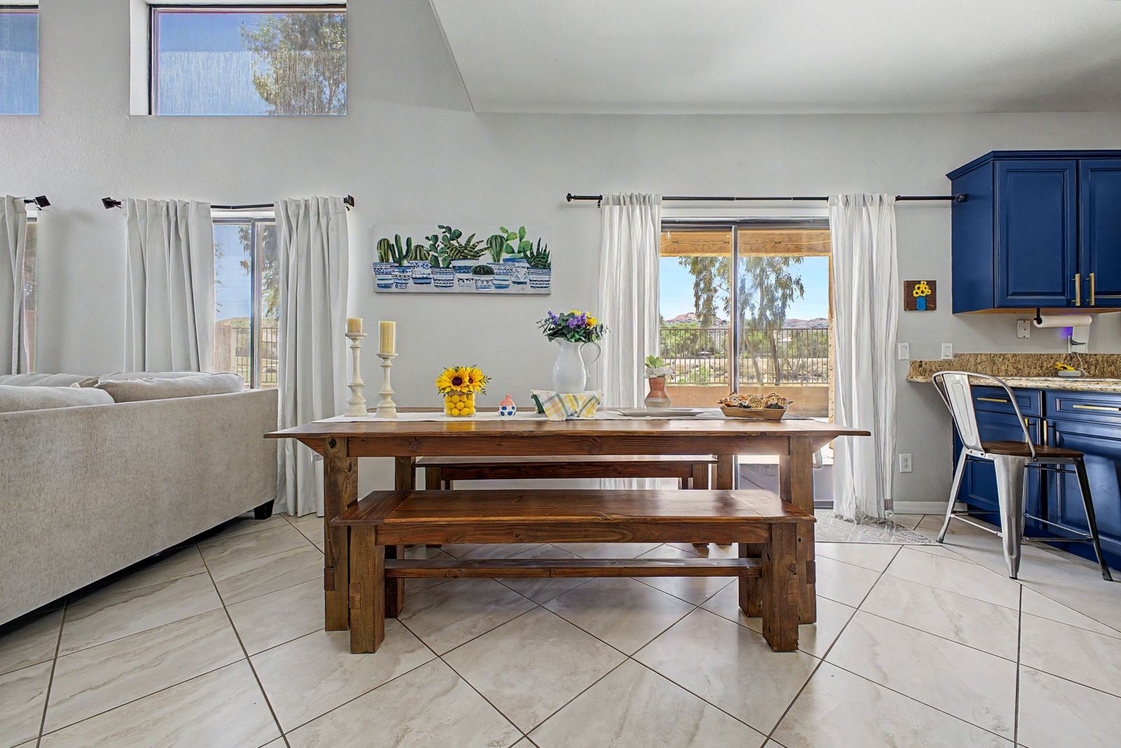 Dining area with patio slider and backyard views