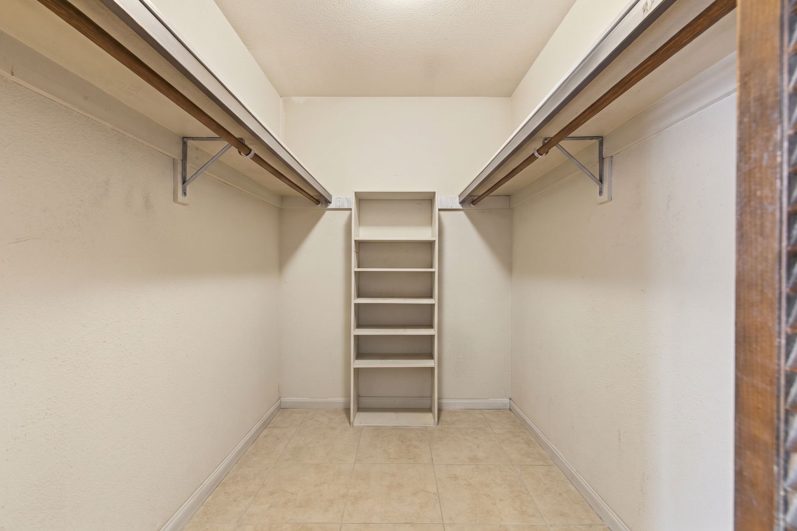 Walk-in closet with built-in shelving