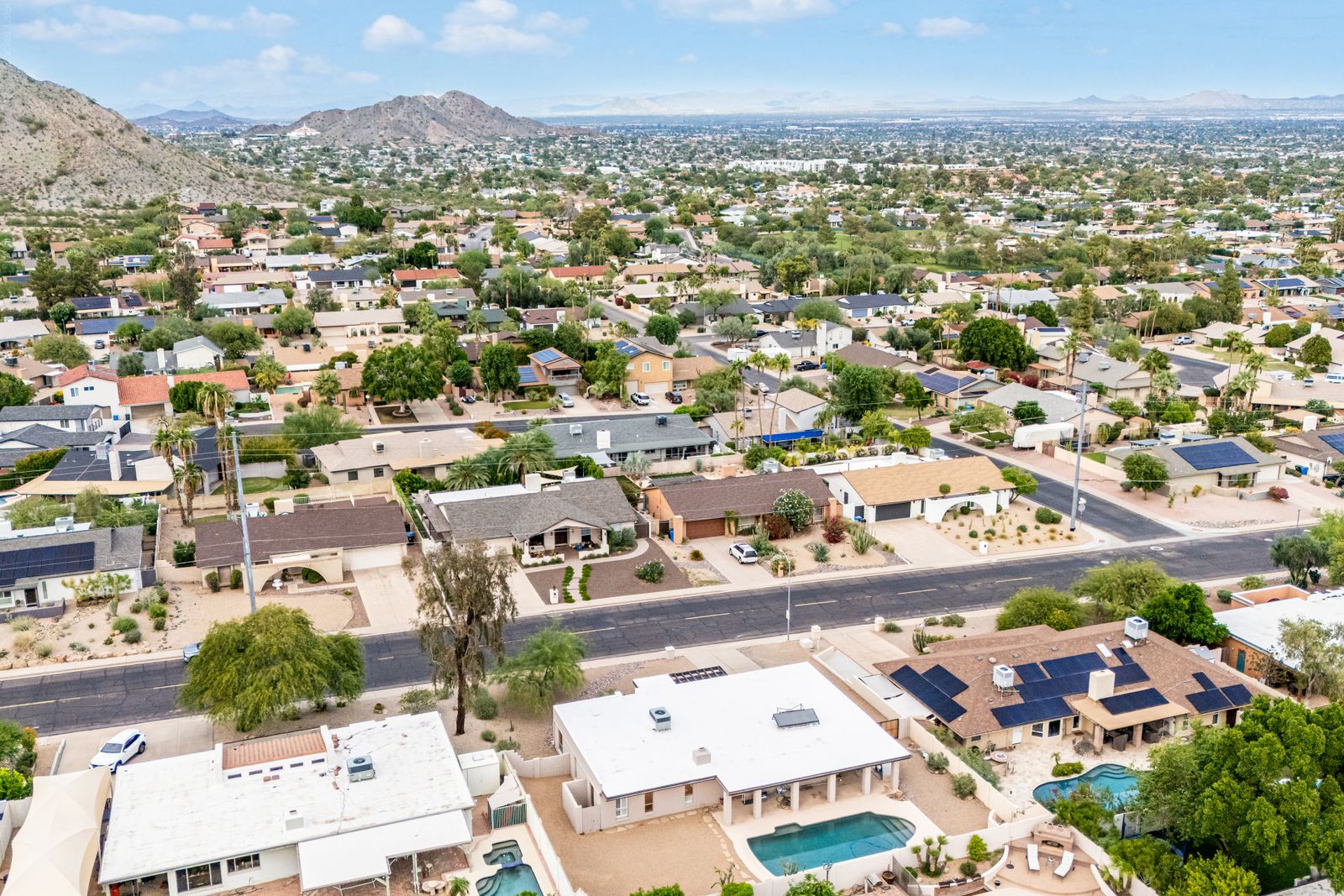 Aerial view of the home and surrounding neighborhood