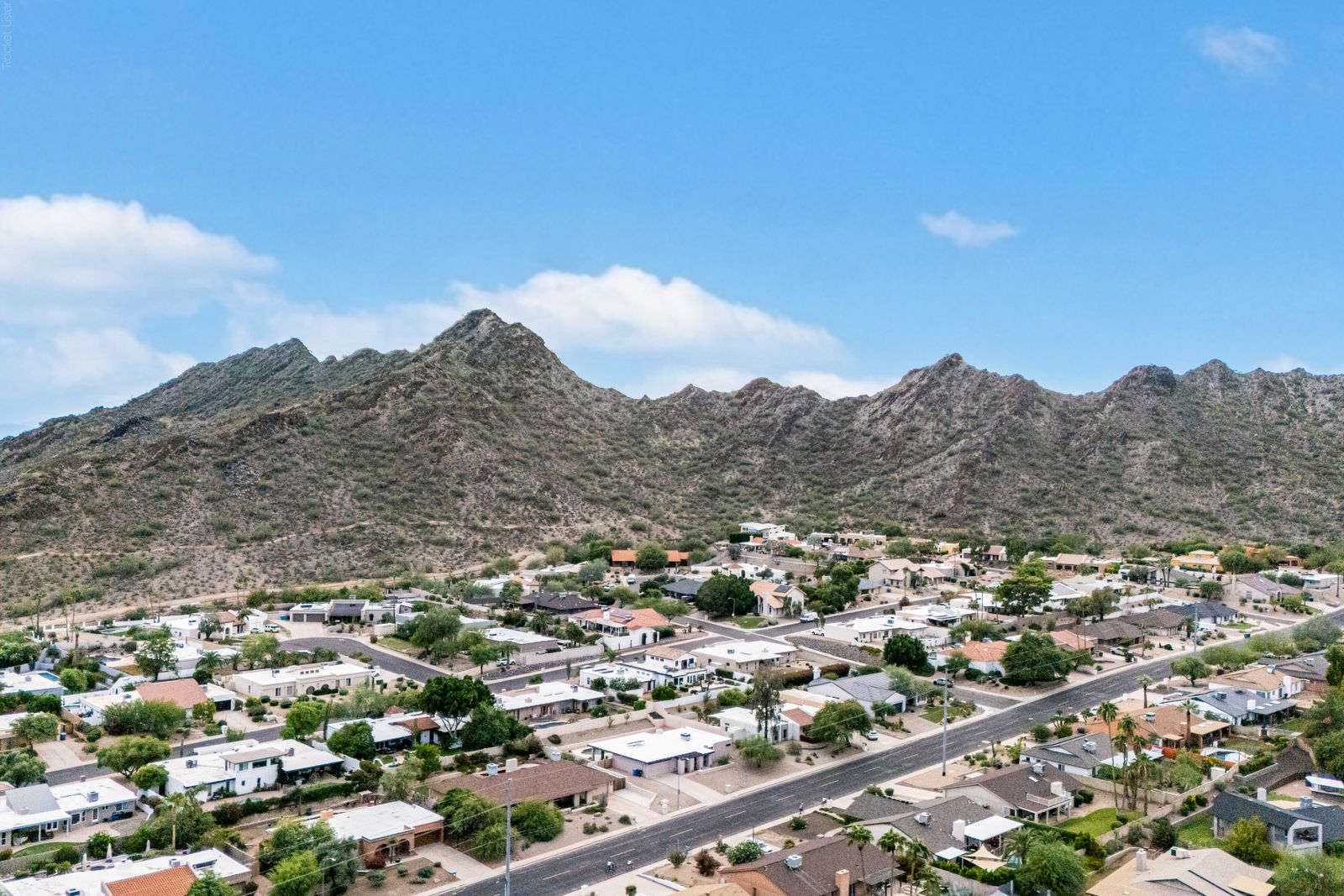Aerial view of the mountain ridge above the neighborhood