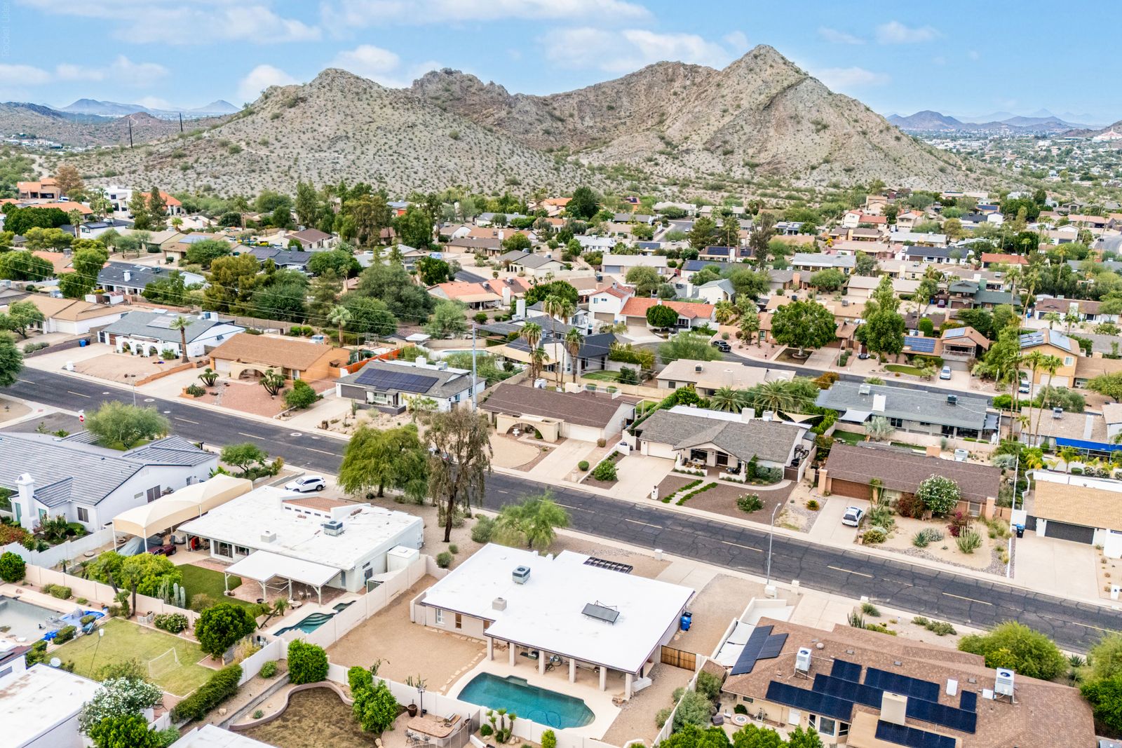 Aerial view of the home and backyard pool