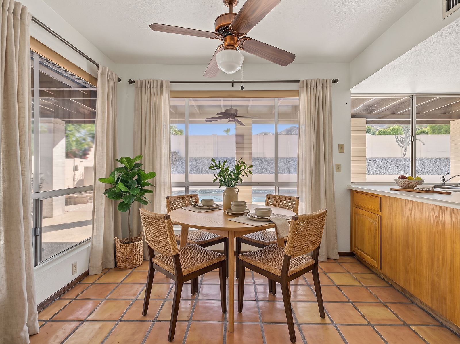 Breakfast nook, virtually staged with a table and chairs