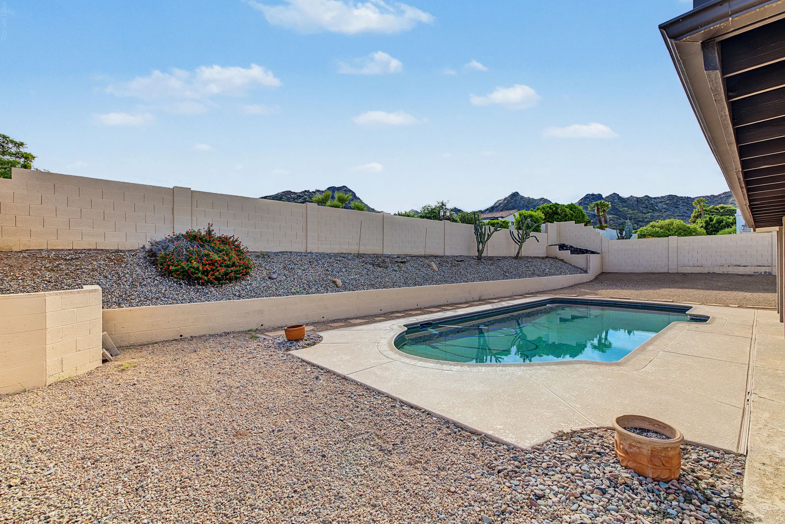 Backyard pool with mountain views
