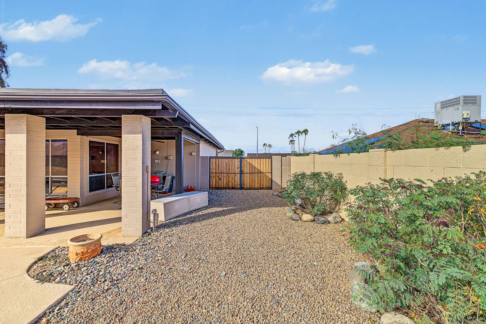 Side yard with gated access